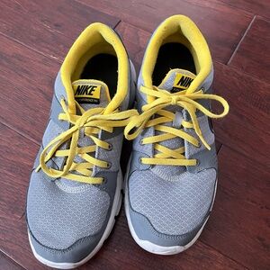 Nike Sneakers with Gray and Yellow Accents